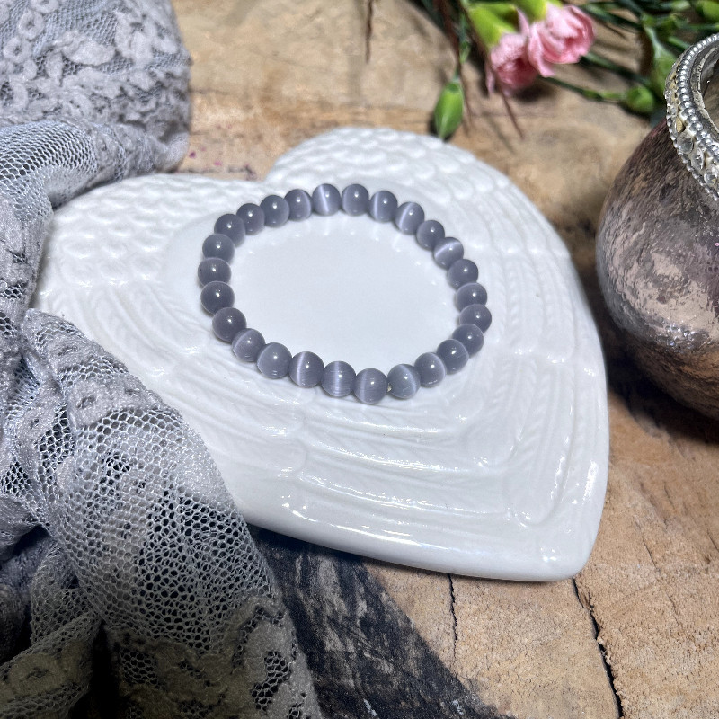 Kocie Oko - przyciąga szczęście, wzmacnia intuicję, pewność siebie. Kamień Czakry Trzeciego Oka, Raka i Wagi