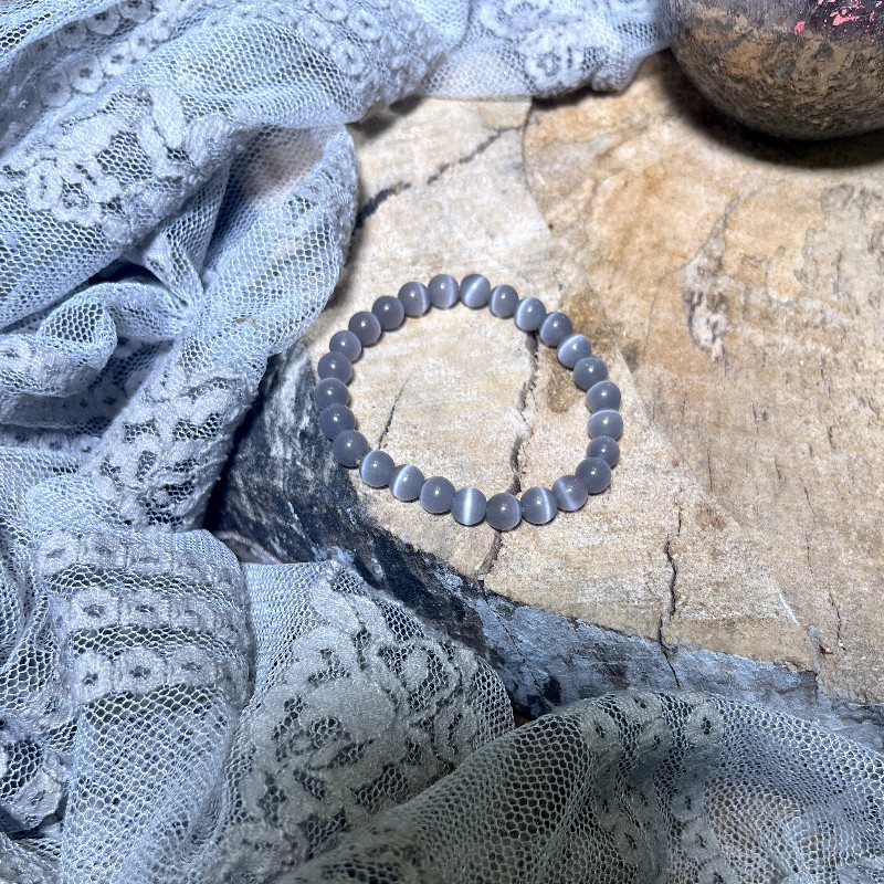 Kocie Oko - przyciąga szczęście, wzmacnia intuicję, pewność siebie. Kamień Czakry Trzeciego Oka, Raka i Wagi